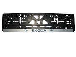 Рамка номера пластиковая серебро с защелкой с надписью "SKODA" фото 